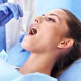 woman receiving dental treatment