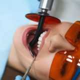 Woman receiving root canal treatment