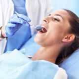 Adult woman having a root canal treatment