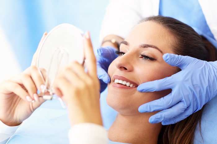 Adult woman at a dental clinic with the root canal specialist